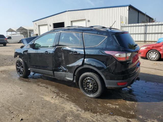 Photo 2 from auction – 2018 FORD ESCAPE SE with VIN 1FMCU9GD1JUA27454