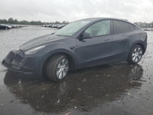 TESLA MODEL Y 2024 with VIN 7SAYGAEE0RF072732 - Photo from auction