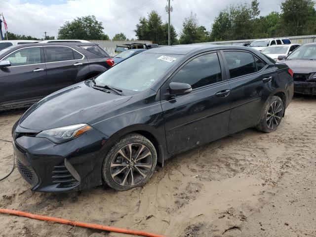 TOYOTA COROLLA L 2019 with VIN 2T1BURHEXKC225116 - Photo from auction