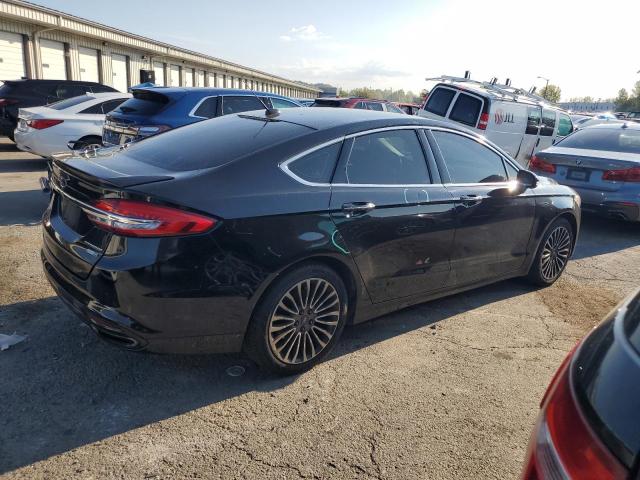 Photo 3 from auction – 2018 FORD FUSION TIT with VIN 3FA6P0D99JR218945