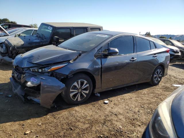 TOYOTA PRIUS PRIM 2018 with VIN JTDKARFP3J3104366 - Photo from auction