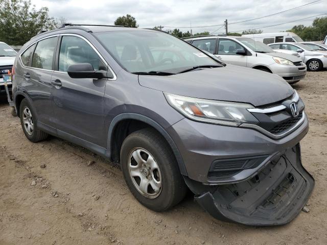 Photo 4 from auction – 2015 HONDA CR-V LX with VIN 5J6RM4H32FL088231