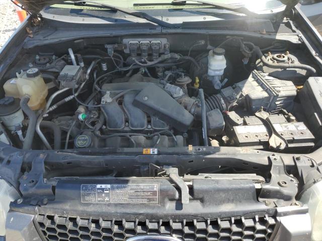 Photo 12 from auction – 2005 FORD ESCAPE LIM with VIN 1FMYU94175KB94533