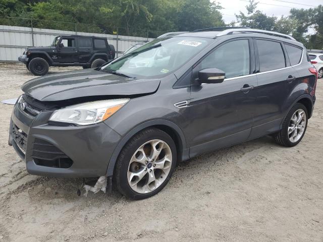 FORD ESCAPE TIT 2016 with VIN 1FMCU9JX0GUB10367 - Photo from auction
