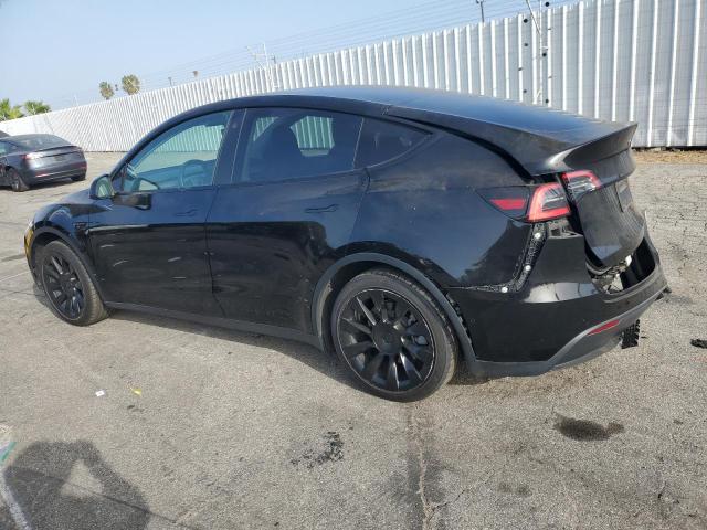 Photo 2 from auction – 2021 TESLA MODEL Y with VIN 5YJYGDEE0MF097749
