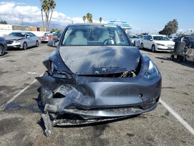 Photo 5 from auction – 2023 TESLA MODEL Y with VIN 7SAYGDED1PF964686