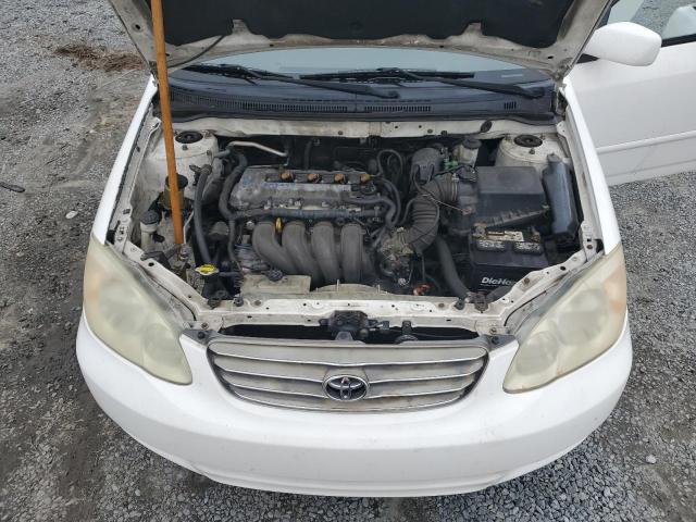 Photo 11 from auction – 2003 TOYOTA COROLLA CE with VIN JTDBR32EX32012707