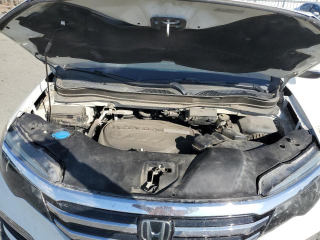 Photo 12 from auction – 2017 HONDA PILOT TOUR with VIN 5FNYF6H91HB092644