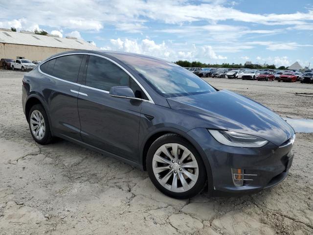 Снимка 4 от търг – 2017 TESLA MODEL X с VIN 5YJXCBE21HF049555
