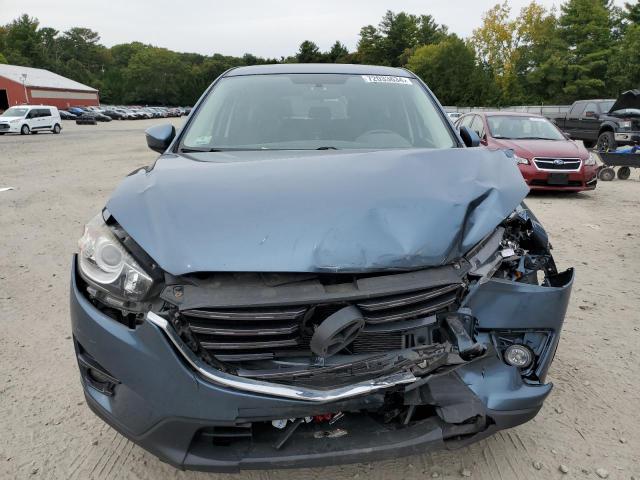 Photo 5 from auction – 2016 MAZDA CX-5 TOURI with VIN JM3KE4CY9G0802342