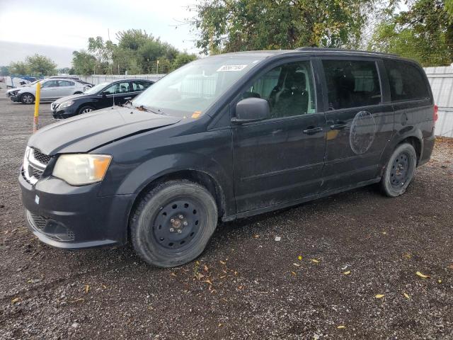 DODGE GRAND CARA 2011 with VIN 2D4RN4DG9BR726829 - Photo from auction
