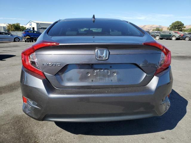 Photo 6 from auction – 2018 HONDA CIVIC EX with VIN 2HGFC2F73JH553323