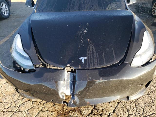 Photo 11 from auction – 2019 TESLA MODEL 3 with VIN 5YJ3E1EA2KF399651