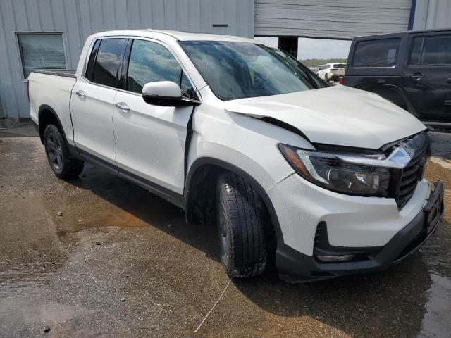 Photo 4 from auction – 2022 HONDA RIDGELINE with VIN 5FPYK3F75NB028329