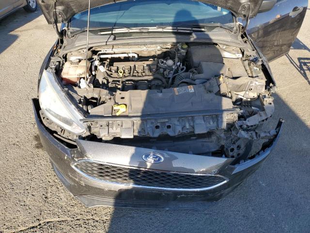 Photo 11 from auction – 2016 FORD FOCUS S with VIN 1FADP3E2XGL363218