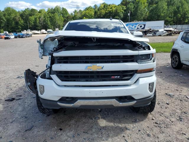 Photo 5 from auction – 2017 CHEVROLET SILVERADO with VIN 3GCUKREC5HG286356