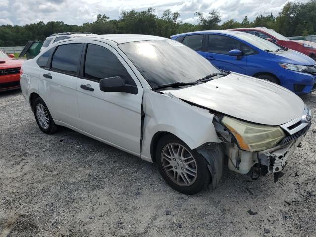Photo 4 from auction – 2011 FORD FOCUS SE with VIN 1FAHP3FN3BW139693