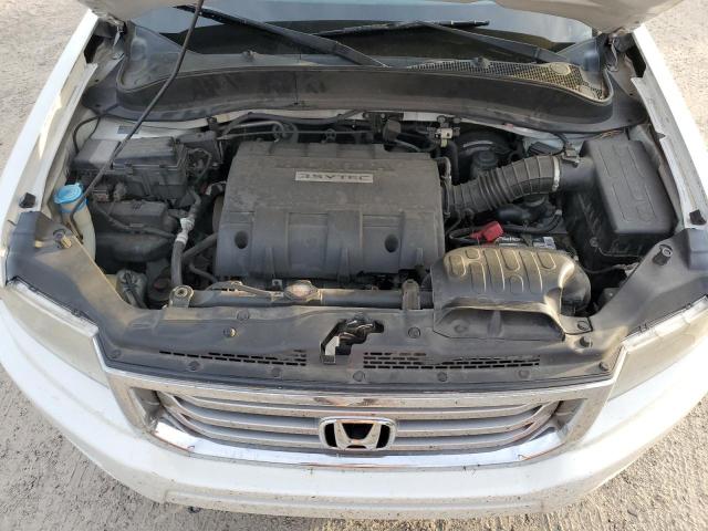 Photo 11 from auction – 2012 HONDA RIDGELINE with VIN 5FPYK1F28CB456210