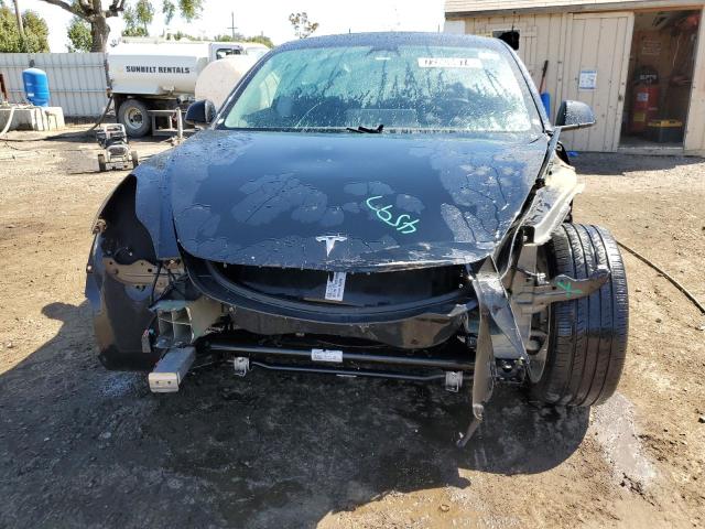 Photo 5 from auction – 2022 TESLA MODEL 3 with VIN 5YJ3E1EAXNF288530