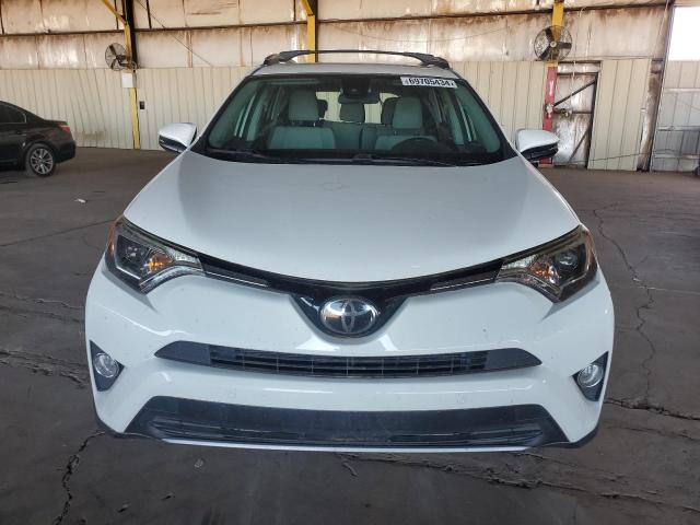 Photo 5 from auction – 2017 TOYOTA RAV4 XLE with VIN JTMRFREV4HJ171807
