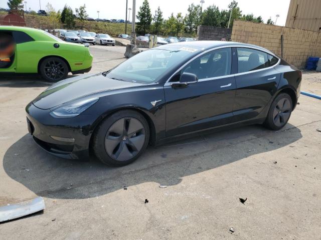 TESLA MODEL 3 2018 with VIN 5YJ3E1EAXJF031409 - Photo from auction
