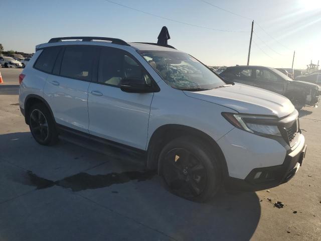 Photo 4 from auction – 2021 HONDA PASSPORT E with VIN 5FNYF8H04MB014544