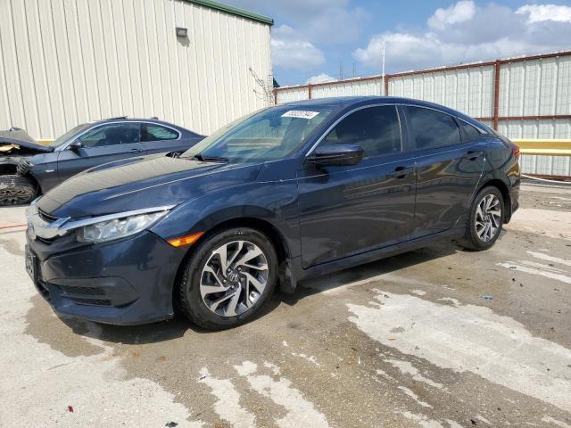 Photo 1 from auction – 2018 HONDA CIVIC EX with VIN 19XFC2F74JE014980