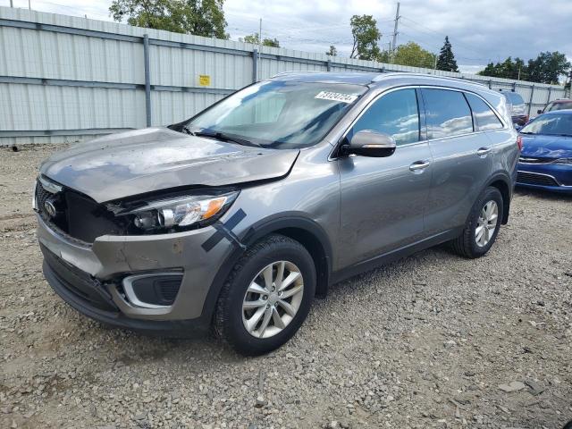 KIA SORENTO LX 2016 with VIN 5XYPG4A36GG134073 - Photo from auction