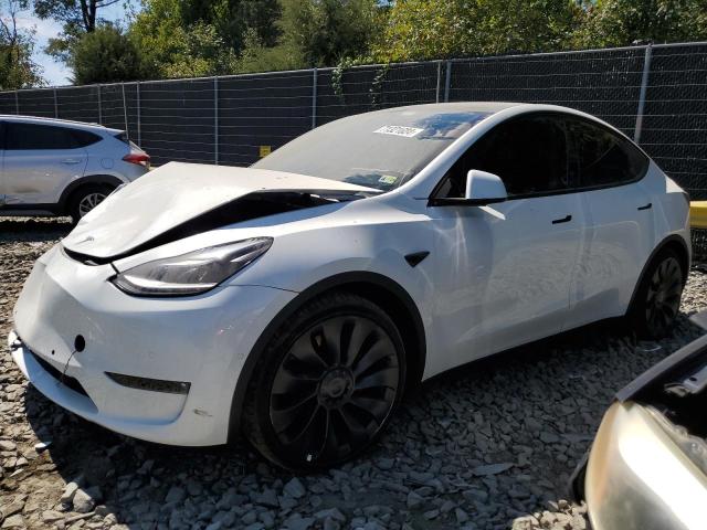 TESLA MODEL Y 2022 with VIN 7SAYGDEF9NF463043 - Photo from auction