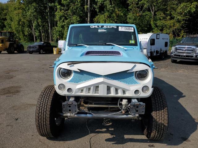Photo 5 from auction – 2016 JEEP WRANGLER U with VIN 1C4BJWDG4GL119260