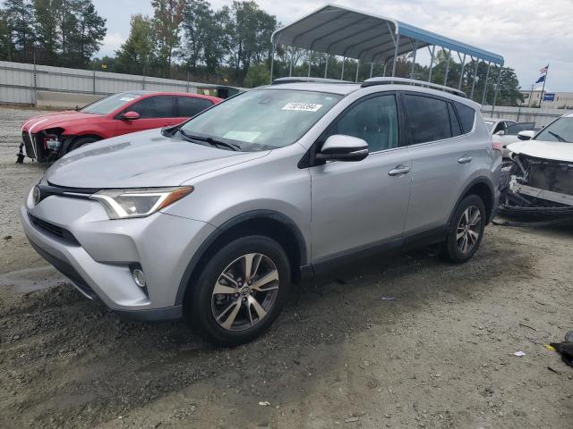 TOYOTA RAV4 XLE 2017 with VIN 2T3WFREV8HW321812 - Photo from auction