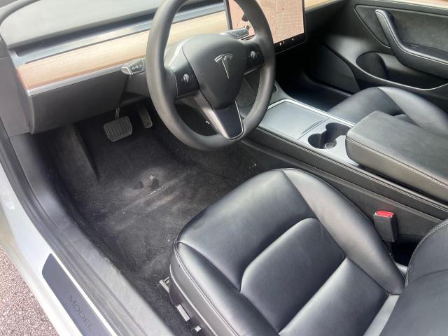 Photo 9 from auction – 2021 TESLA MODEL 3 with VIN 5YJ3E1EA1MF051312