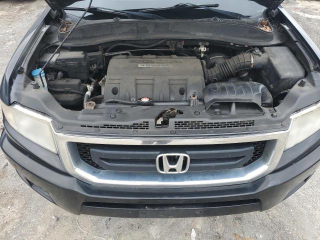 Photo 11 from auction – 2011 HONDA RIDGELINE with VIN 5FPYK1F23BB009542