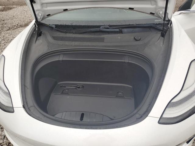 Photo 11 from auction – 2019 TESLA MODEL 3 with VIN 5YJ3E1EA6KF412224