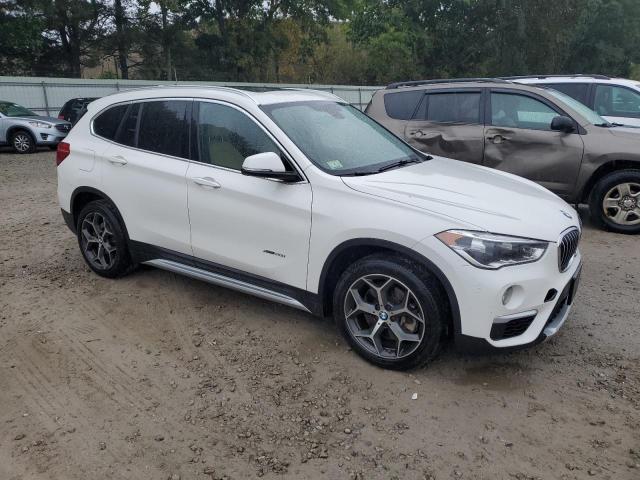 Photo 4 from auction – 2017 BMW X1 XDRIVE2 with VIN WBXHT3C36H5F73491