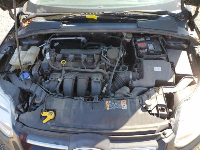Photo 11 from auction – 2014 FORD FOCUS SE with VIN 1FADP3F29EL366977