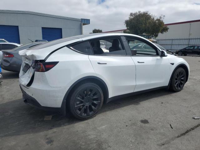 Photo 3 from auction – 2020 TESLA MODEL Y with VIN 5YJYGDEE9LF011238