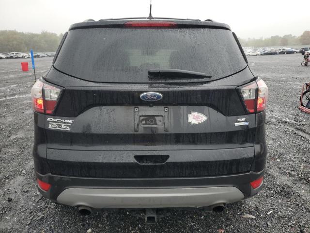 Photo 6 from auction – 2018 FORD ESCAPE SE with VIN 1FMCU9GD1JUD12185