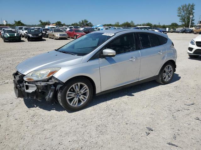 FORD FOCUS SEL 2012 with VIN 1FAHP3M23CL338674 - Photo from auction