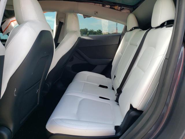 Photo 10 from auction – 2023 TESLA MODEL Y with VIN 7SAYGAEE3PF853662