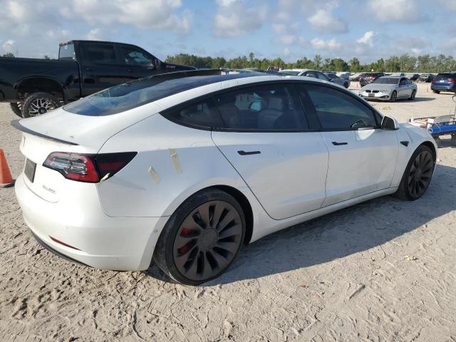 Photo 3 from auction – 2021 TESLA MODEL 3 with VIN 5YJ3E1ECXMF044795