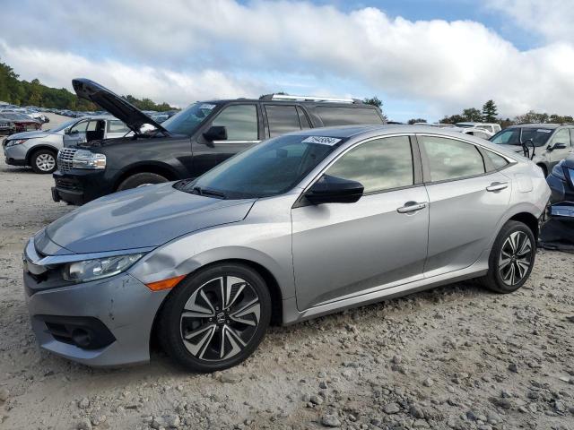 Photo 1 from auction – 2018 HONDA CIVIC EX with VIN JHMFC1F35JX032457