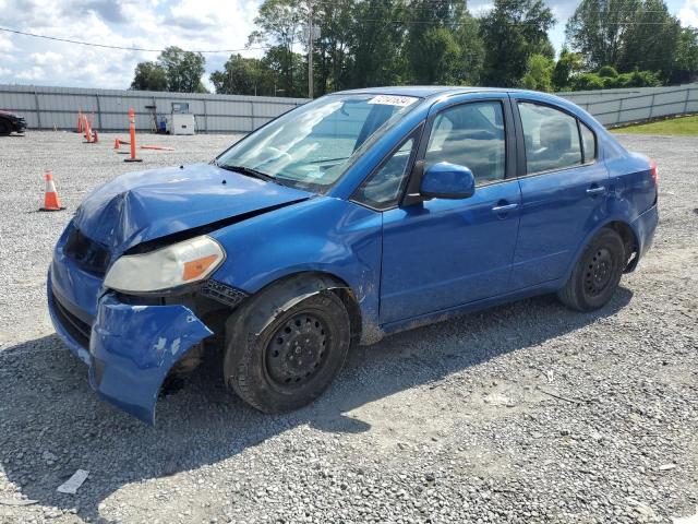SUZUKI SX4 LE 2012 with VIN JS2YC5A33C6302308 - Photo from auction