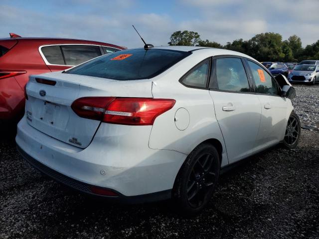 Photo 3 from auction – 2016 FORD FOCUS SE with VIN 1FADP3F28GL311858