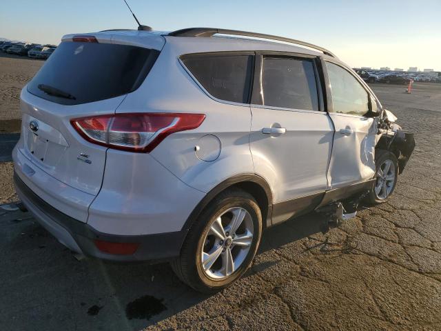 Photo 3 from auction – 2014 FORD ESCAPE SE with VIN 1FMCU9GX5EUE02780