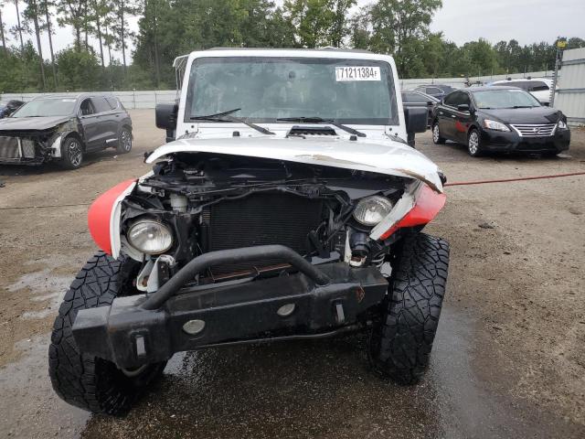 Photo 5 from auction – 2015 JEEP WRANGLER U with VIN 1C4BJWFG2FL566715
