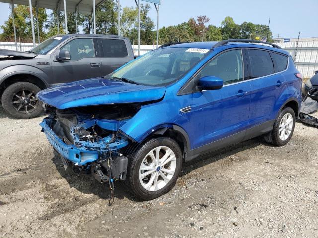 FORD ESCAPE SE 2018 with VIN 1FMCU9GD9JUD50490 - Photo from auction