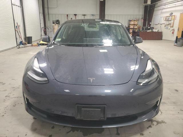 Photo 5 from auction – 2022 TESLA MODEL 3 with VIN 5YJ3E1EA5NF288290