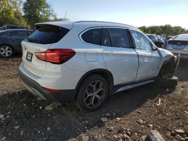 Photo 3 from auction – 2018 BMW X1 XDRIVE2 with VIN WBXHT3C33J5K31032