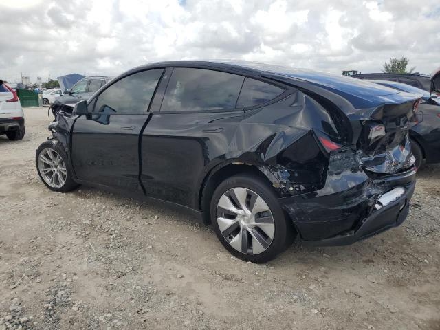 Photo 2 from auction – 2023 TESLA MODEL Y with VIN 7SAYGDEE5PA085231